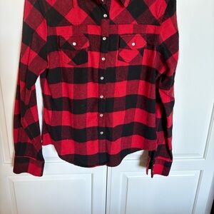 Red and black flannel shirt.  Fits like a small.